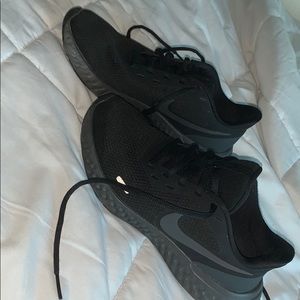 Black Nike Revolutions